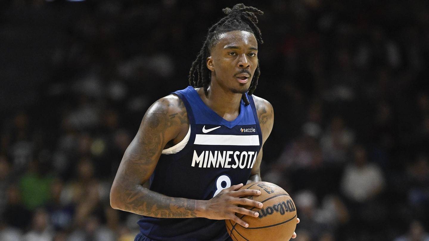 Bones Hyland brings the ball up the floor in a Timberwolves jersey.