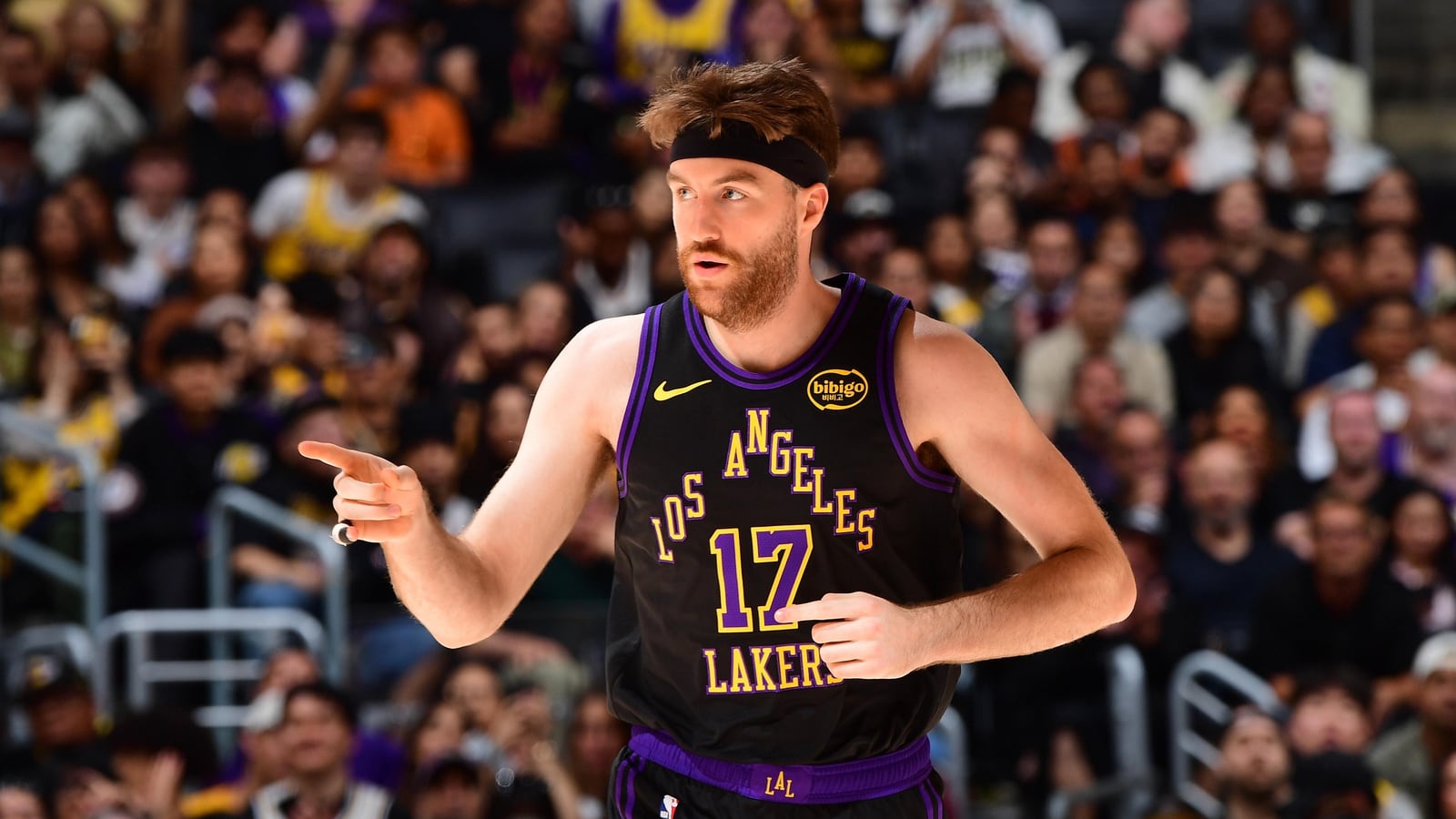 Drew Timme points to a teammate while playing for the Los Angeles Lakers.